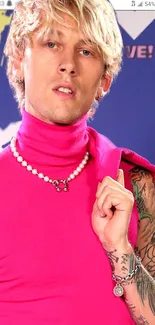 A striking portrait of a person in vibrant pink attire with tattoos and jewelry.