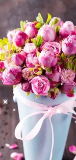 Vibrant pink roses in a blue vase with sparkles.