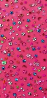 Vibrant pink wallpaper with colorful gemstones and stars.