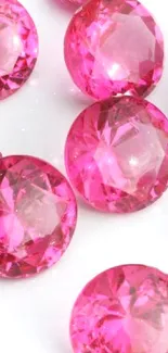 Vibrant pink gemstones on a white background. Perfect for a stylish wallpaper.