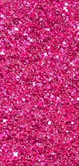 Vibrant pink glitter texture wallpaper.