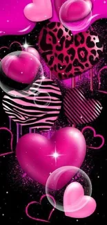 Vibrant pink heart with glossy black stars on wallpaper.