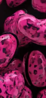 Vibrant pink and black heart pattern wallpaper.