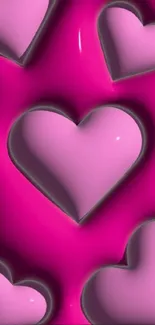 Vibrant pink 3D heart pattern wallpaper.