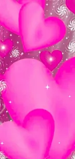 Vibrant pink heart wallpaper with swirling patterns.