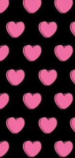 Black wallpaper with vibrant pink heart pattern.