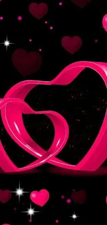 Vibrant pink heart wallpaper with dark background.