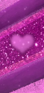 Bright pink heart with sparkles and textured background.