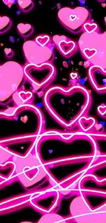 Neon pink hearts on a dark wallpaper background.