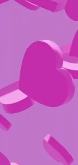 Vibrant pink 3D hearts on a soft pink background.