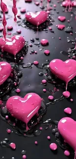 Glossy dripping pink hearts on black background.