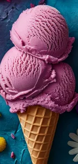 Vibrant pink ice cream cone on colorful floral background.