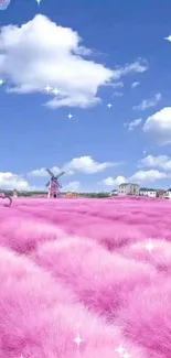 Beautiful pink fluffy fields under a vibrant blue sky with clouds.