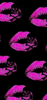 Pink lips pattern on black wallpaper.