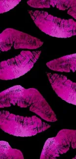 Pattern of vibrant pink lips on a black background.