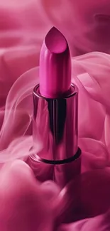 Pink lipstick with flowing fabric background.