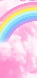 Pink clouds with a vibrant rainbow arched above, creating a whimsical scene.