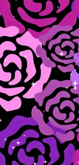 Vibrant pink and purple abstract rose pattern wallpaper.