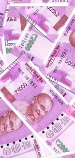 Dynamic wallpaper with pink Indian Rupee notes designed for smartphone screens.