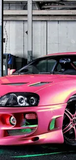 Sports car in vibrant pink with dynamic lighting.