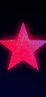 Vibrant pink star with sparkles on a dark background wallpaper.