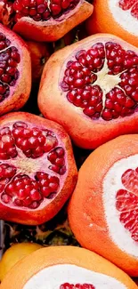 Vibrant red pomegranate fruits in a cluster.