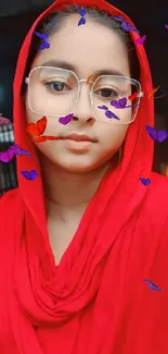 Girl with red scarf and butterflies, wearing glasses.