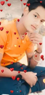 Portrait of a young person in an orange shirt with heart elements.