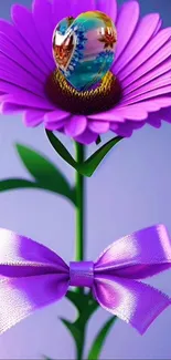 Purple flower with heart gem and bow.
