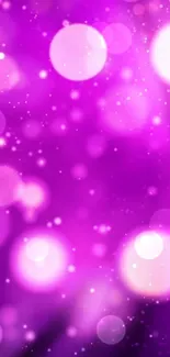 Purple bokeh wallpaper with glowing orbs and dreamy effect for mobile screens.