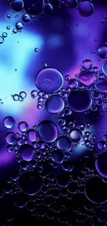 Vibrant abstract wallpaper with purple bubbles.