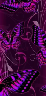 Vibrant purple butterflies with floral patterns on a mobile wallpaper.