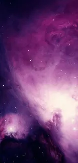 Mesmerizing purple galaxy wallpaper with nebula and stars for mobile devices.