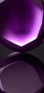 Purple gem on reflective black background.