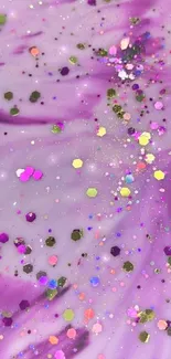 A vibrant purple wallpaper with glitter sparkles and colorful abstract swirls.