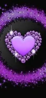 Purple heart with shimmering sequins on a black background.