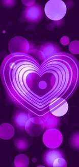 Vibrant purple heart with glowing bubbles wallpaper.