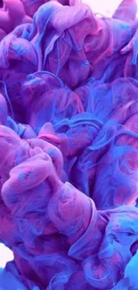 Vibrant purple and blue ink swirl wallpaper.