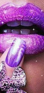 Close-up of vibrant purple lips and a glamorous nail design.