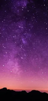 Purple starry night sky with vibrant gradient for a mobile wallpaper.