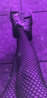 Purple sneakers with fishnet stockings on tiled floor.