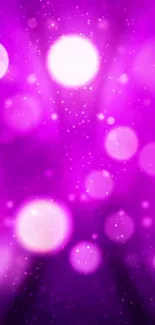 Vibrant purple wallpaper with sparkle bokeh lights.