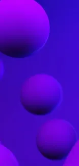 Vibrant purple spheres against a deep blue background mobile wallpaper.