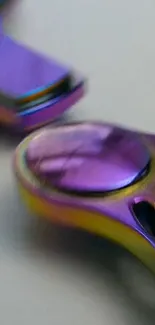 Vibrant purple fidget spinner with metallic accents.