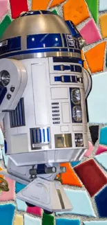 R2D2 against a colorful mosaic tile wall background.