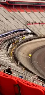 Exciting racetrack view with vibrant red seats.