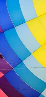 Colorful balloon with rainbow hues, perfect for vibrant phone wallpaper.