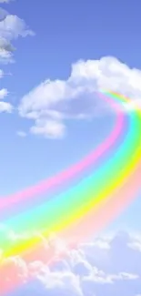 Colorful rainbow arcs through a fluffy cloud against a blue sky.