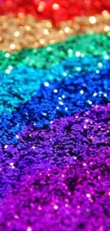 Vibrant glitter wallpaper with rainbow colors and sparkling texture.