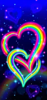 Vibrant rainbow heart with neon on deep blue background.